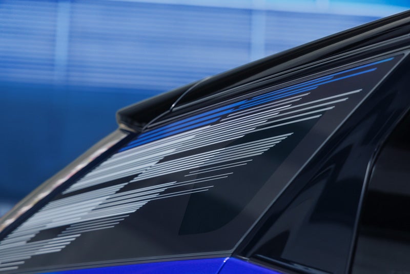 Close-up of the Modern Pattern on the 2026 OPTIQ-V Rear Quarter Glass | Ken Barrett Chevrolet Cadillac in BATAVIA NY