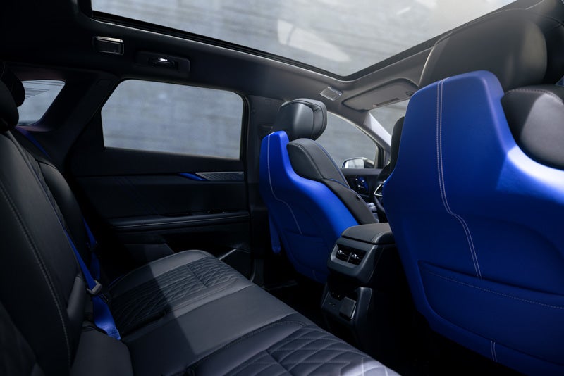 Back Seat View of the 2026 OPTIQ-V Blue Front Seats, Sun Roof, and Interior | Ken Barrett Chevrolet Cadillac in BATAVIA NY